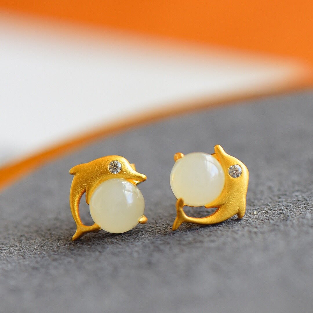 Delicate white jade studs with warm gold edging, perfect for daily wear or gifting.