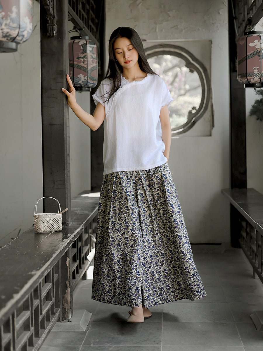 Woman walking in soft floral maxi skirt – airy and graceful movement