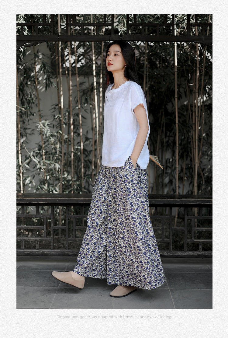 Front view of long printed skirt paired with white tee – effortless boho look