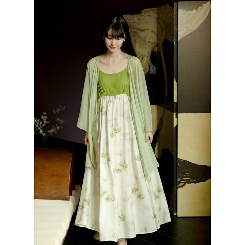 Front view of a flowing pastel green Hanfu dress with layered skirts, styled with grace.