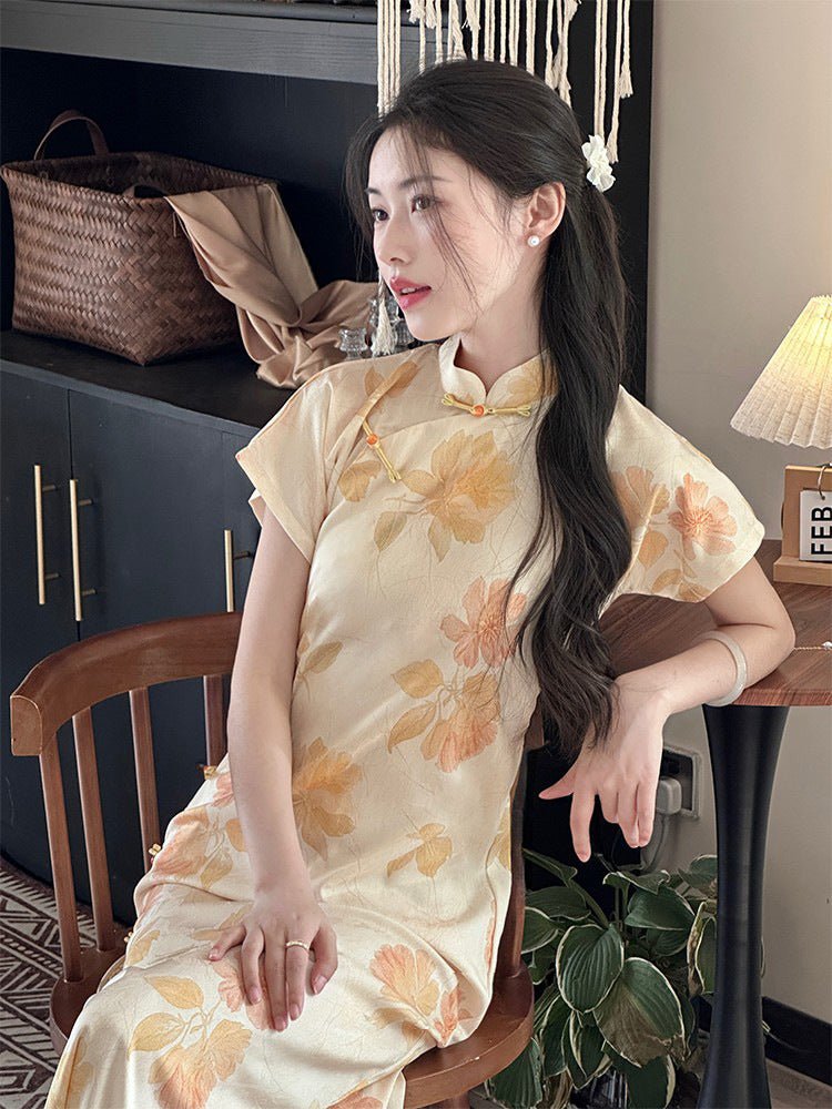 Charming lady in a retro yellow qipao sitting gracefully, surrounded by warm lights and classic furniture.